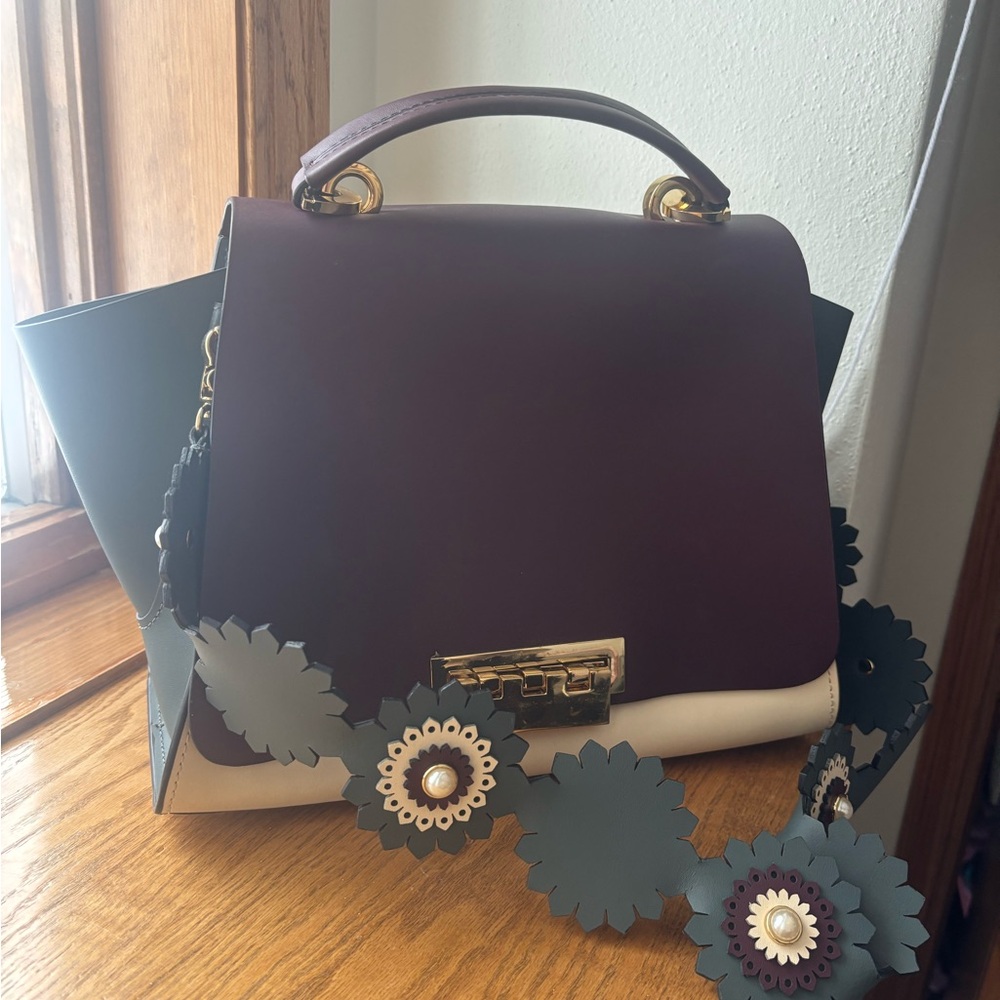 Elegant Purple and Cream Handbag